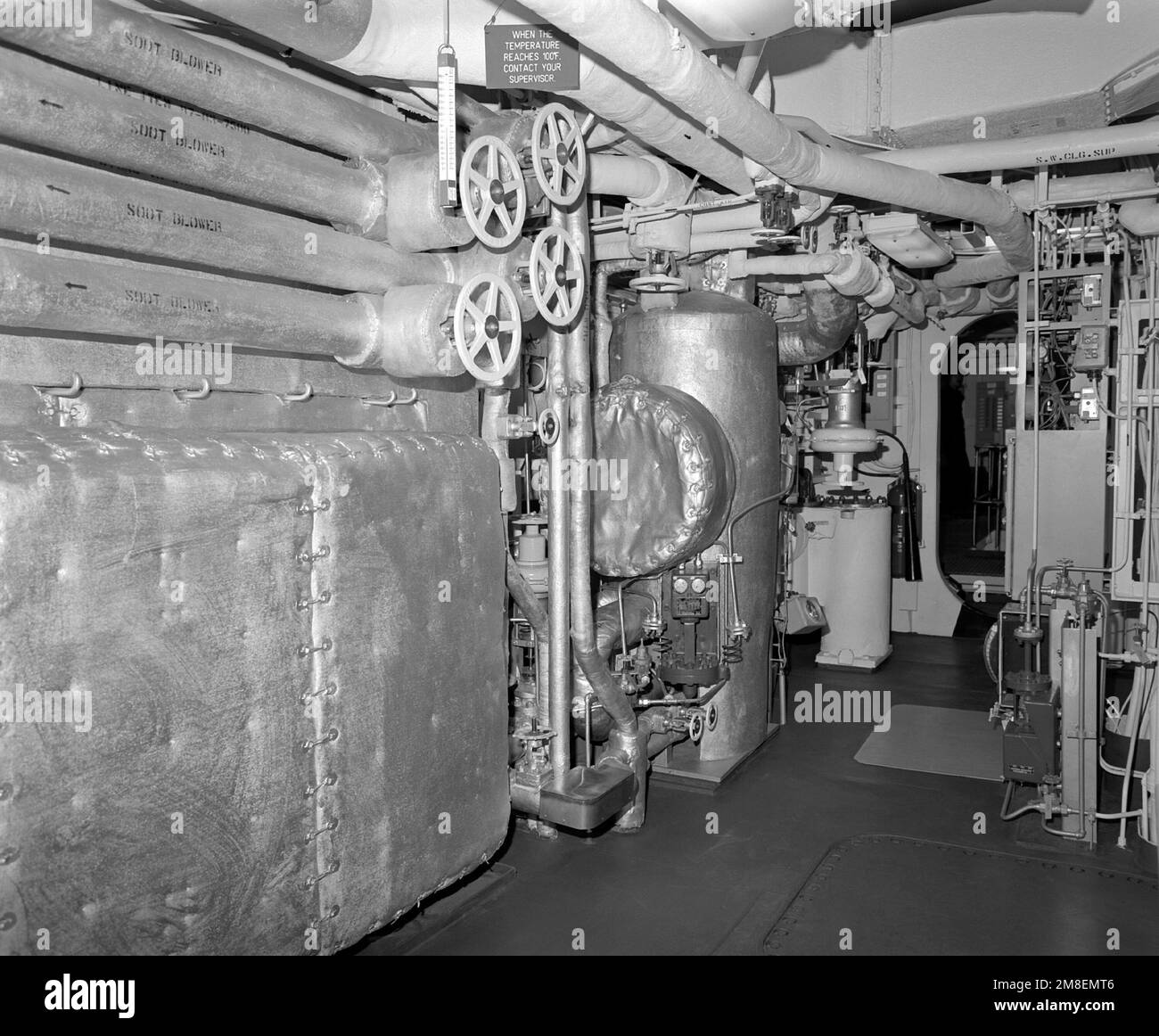 A view of main engine room No. 2 on the guided missile cruiser COWPENS ...