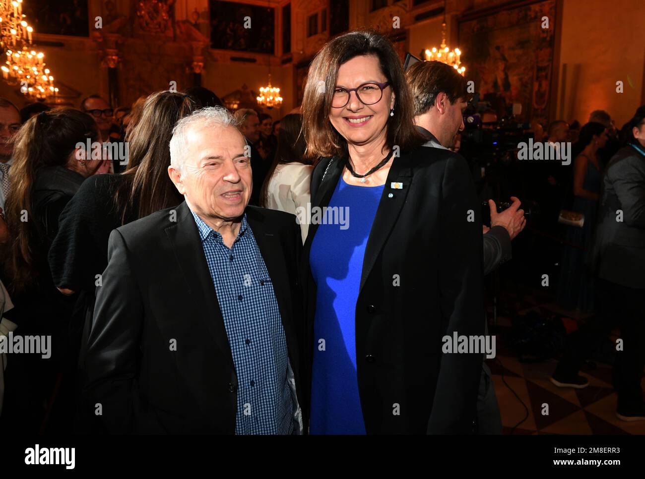 Munich, Germany. 13th Jan, 2023. Günther Sigl, musician of the Spider Murphy Gang, and State Parliament President Ilse Aigner celebrate at the New Year's reception of the Bavarian Minister President at the Munich Residence. Credit: Felix Hörhager/dpa/Alamy Live News Stock Photo