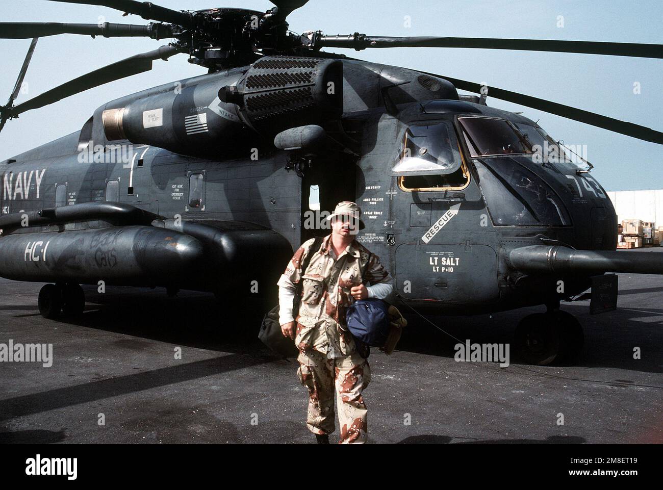 Operation Stallion A combat cameraman disembarks from a Helicopter Combat Support Squadron ...