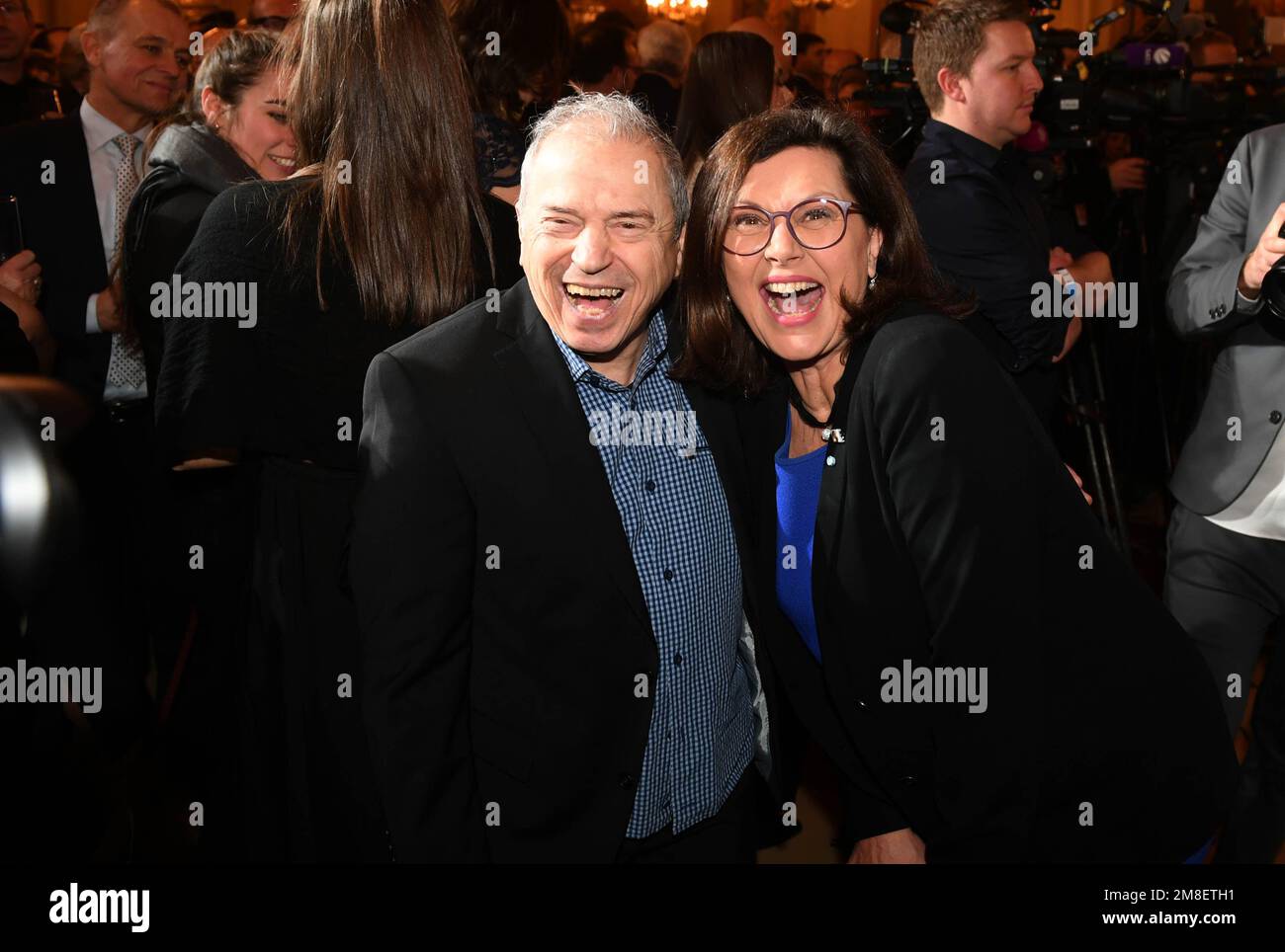 Munich, Germany. 13th Jan, 2023. Günther Sigl, musician with the Spider Murphy Gang, and State Parliament President Ilse Aigner celebrate at the Bavarian Minister President's New Year's reception at the Munich Residence. Credit: Felix Hörhager/dpa/Alamy Live News Stock Photo