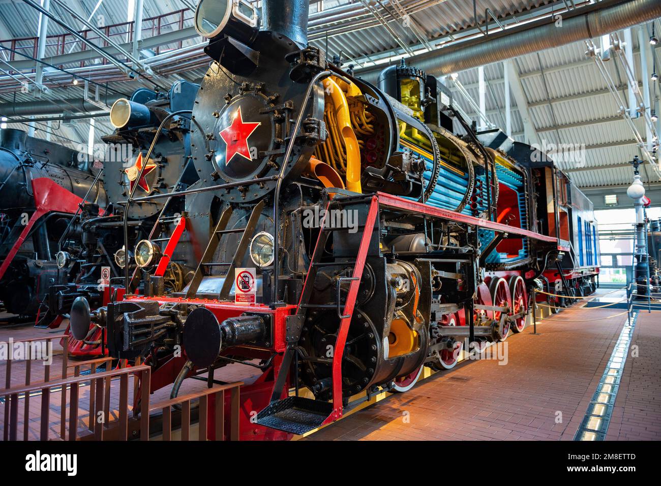 SAINT PETERSBURG, RUSSIA - AUGUST 16, 2018: Old steam locomotive in section. Exposition of the Museum of Railway Transport. Museum of Russian Railways Stock Photo