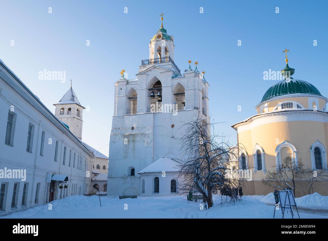 The ancient bell tower of the Spaso-Preobrazhensky Monastery on a sunny January morning. Golden Ring of Russia Stock Photo