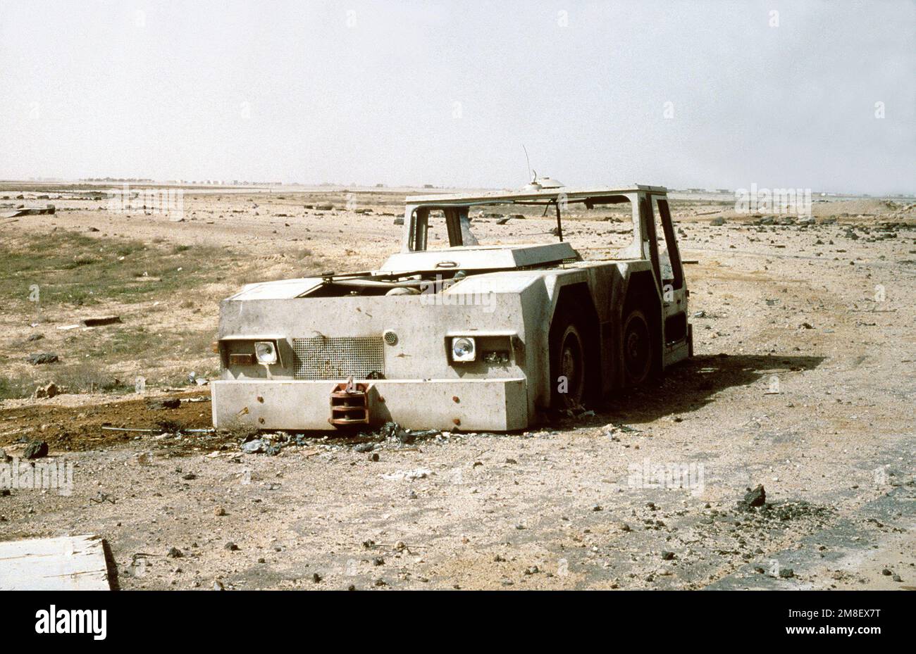 A view of a burned Iraqi truck on an airfield destroyed by Coalition bombing during Operation Desert Storm.. Subject Operation/Series: DESERT STORM Base: Jalibah Country: Iraq(IRQ) Stock Photo