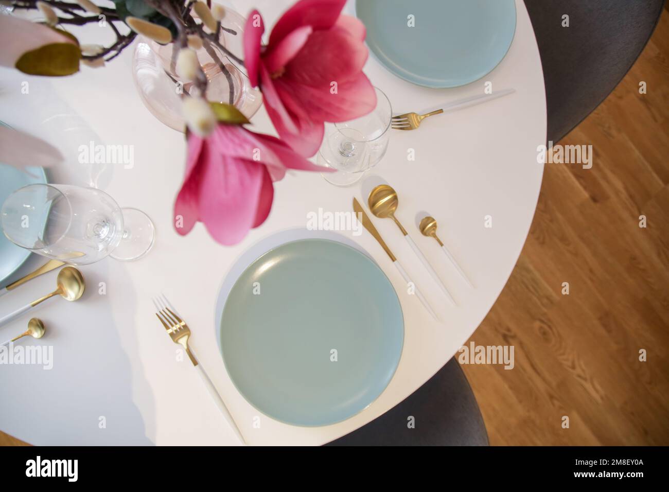 Curated visual reference: Round Dining Table In Modern Apartment Table Setting With Flowers Photo Inspiration
