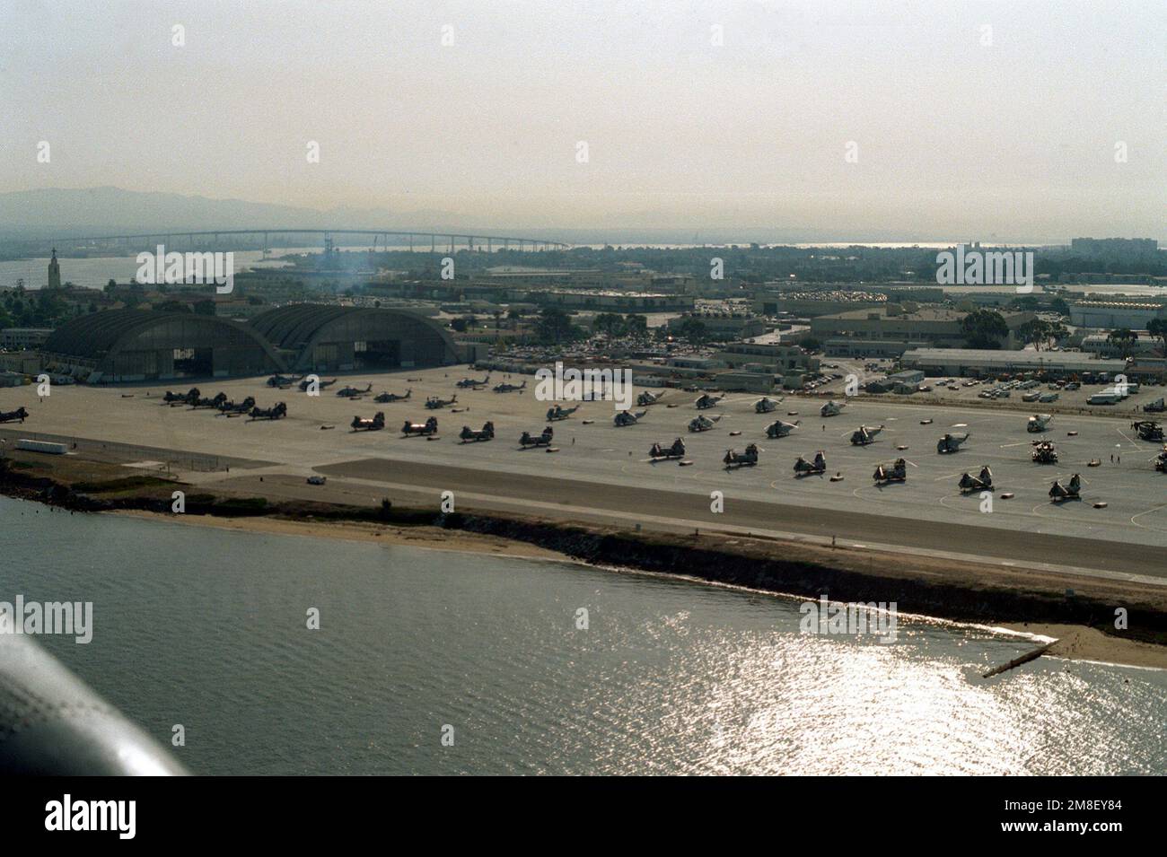 An aerial view of various helicopters, including CH-46 Sea Knight, SH-3 ...