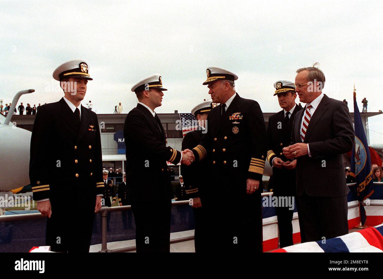 LT. Robert Wetzel, left, and LT. Jeffrey Zuan, third from left, stand