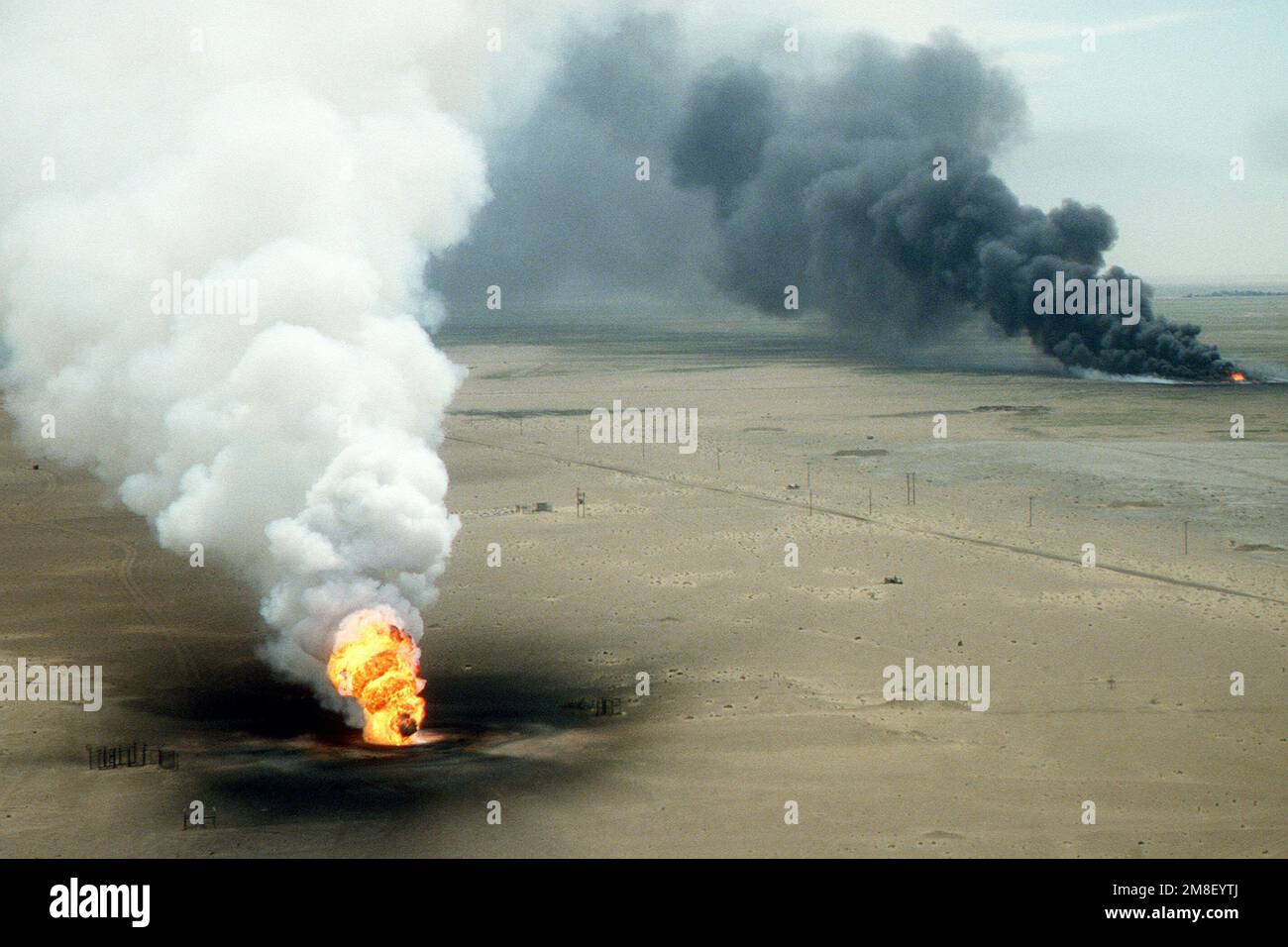 Oil well fires rage outside Kuwait City in the aftermath of Operation