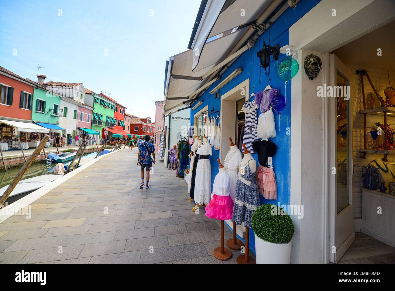 BURANO ISLAND, VENICE, ITALY JULY 4, 2022 Tourists among the