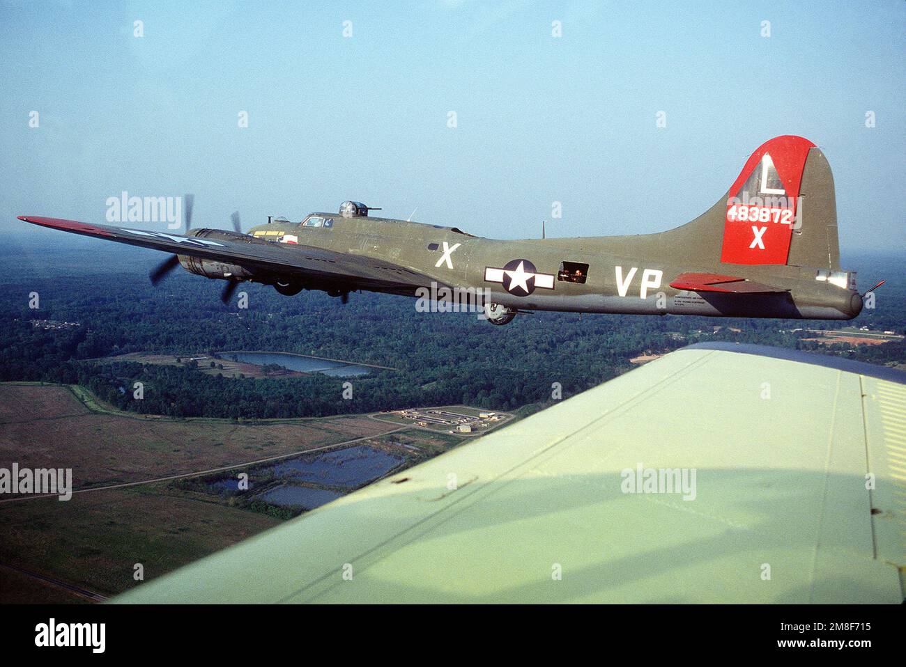 An air to air left side view of the restored World War II B 17G