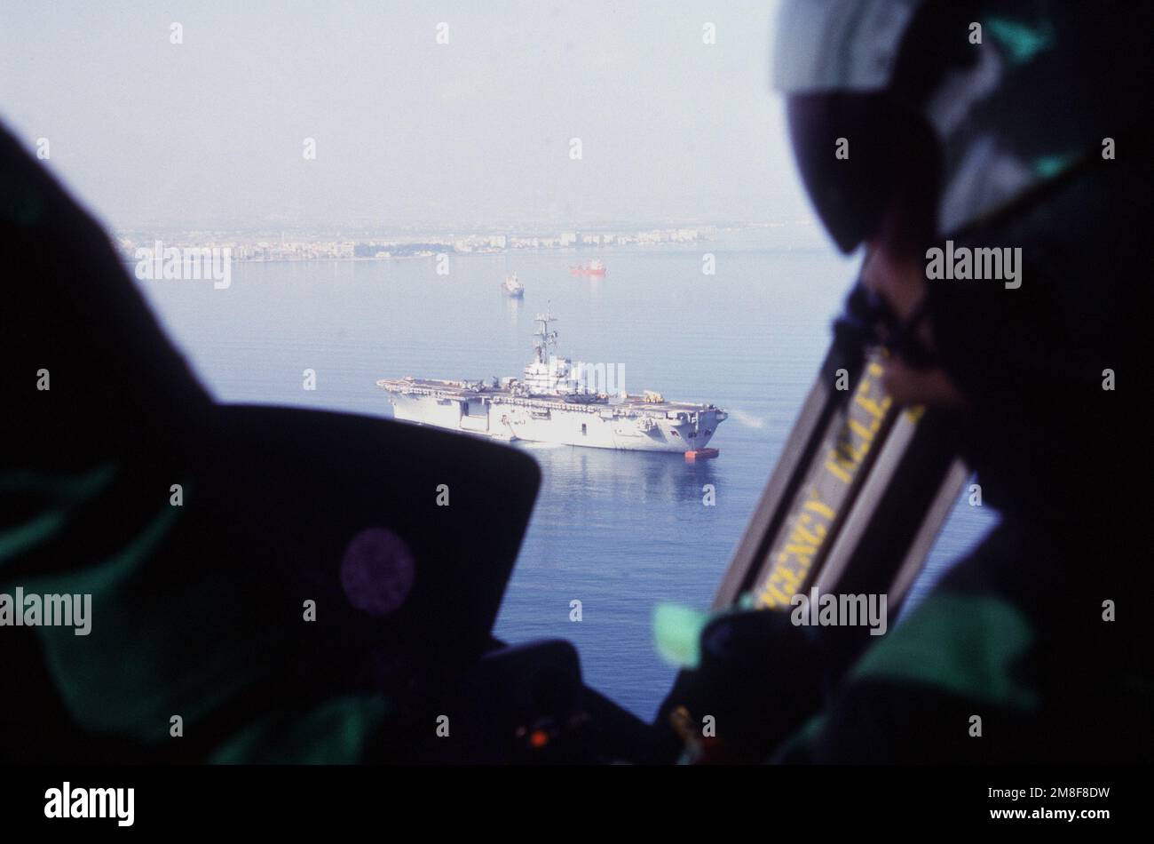 As seen from aboard a UH-1 Iroquois helicopter, the amphibious assault ...