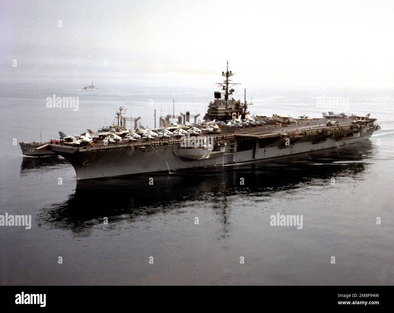 A port bow view of the aircraft carrier USS RANGER (CV-61) being ...