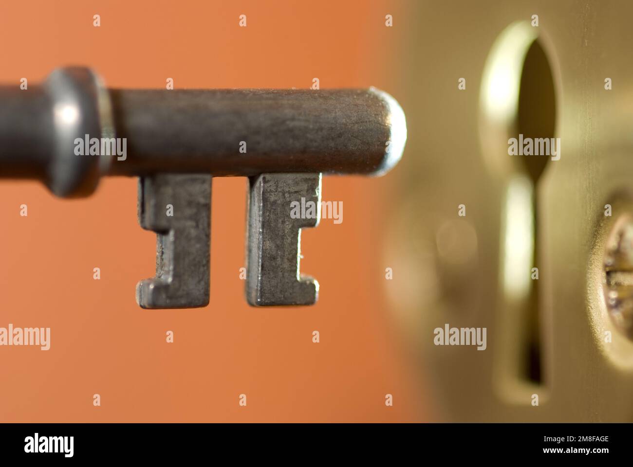 Key and door lock keyhole. Low DOF Stock Photo Alamy