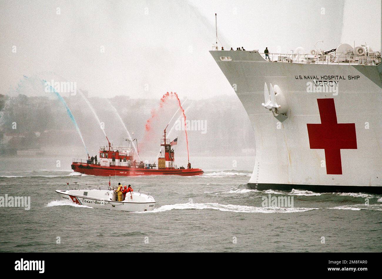 A Fire Boat Sprays Water To Welcome The Hospital Ship USNS MERCY (T-AH ...