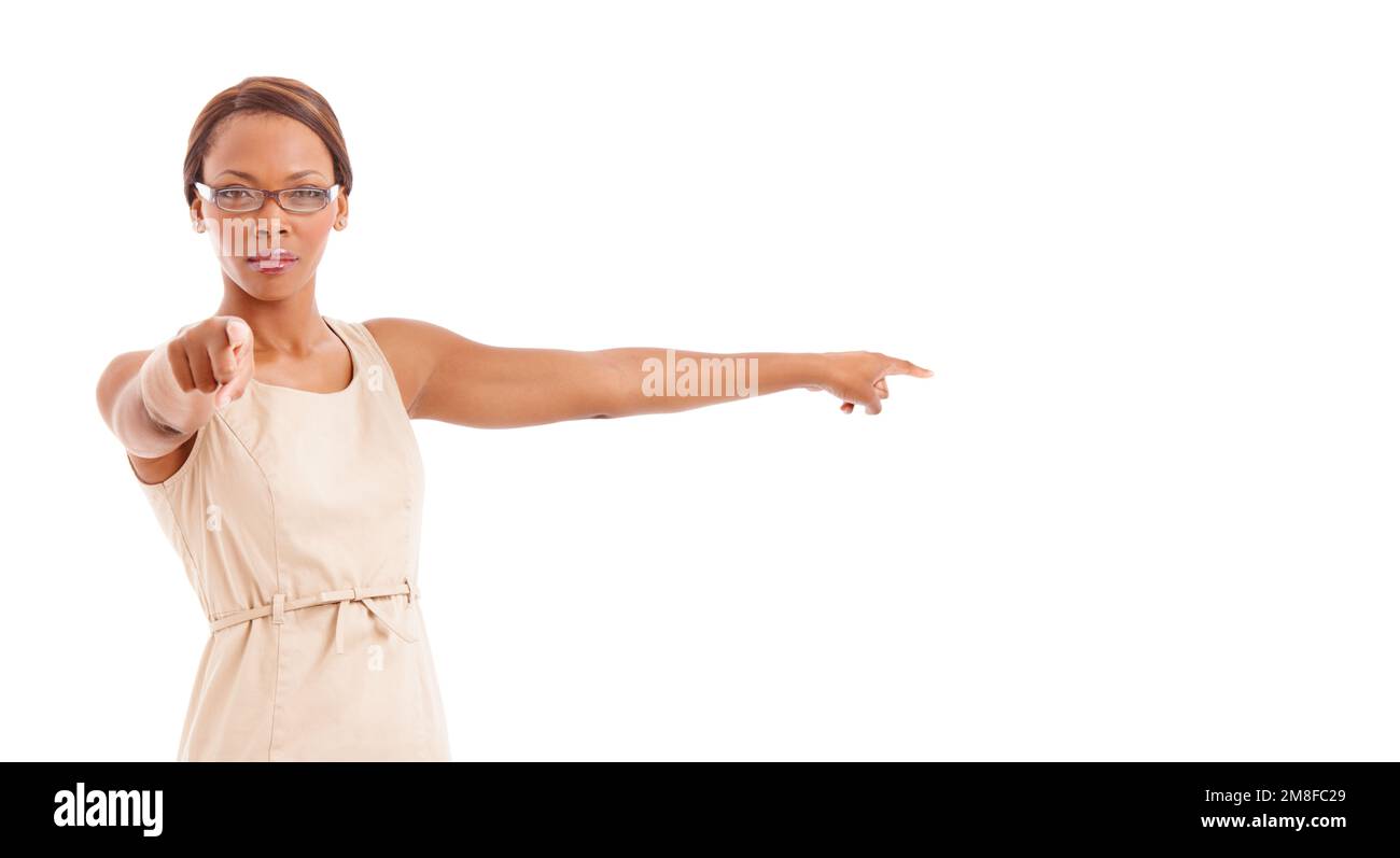 You are in trouble. A stern business woman pointing at the camera. Stock Photo