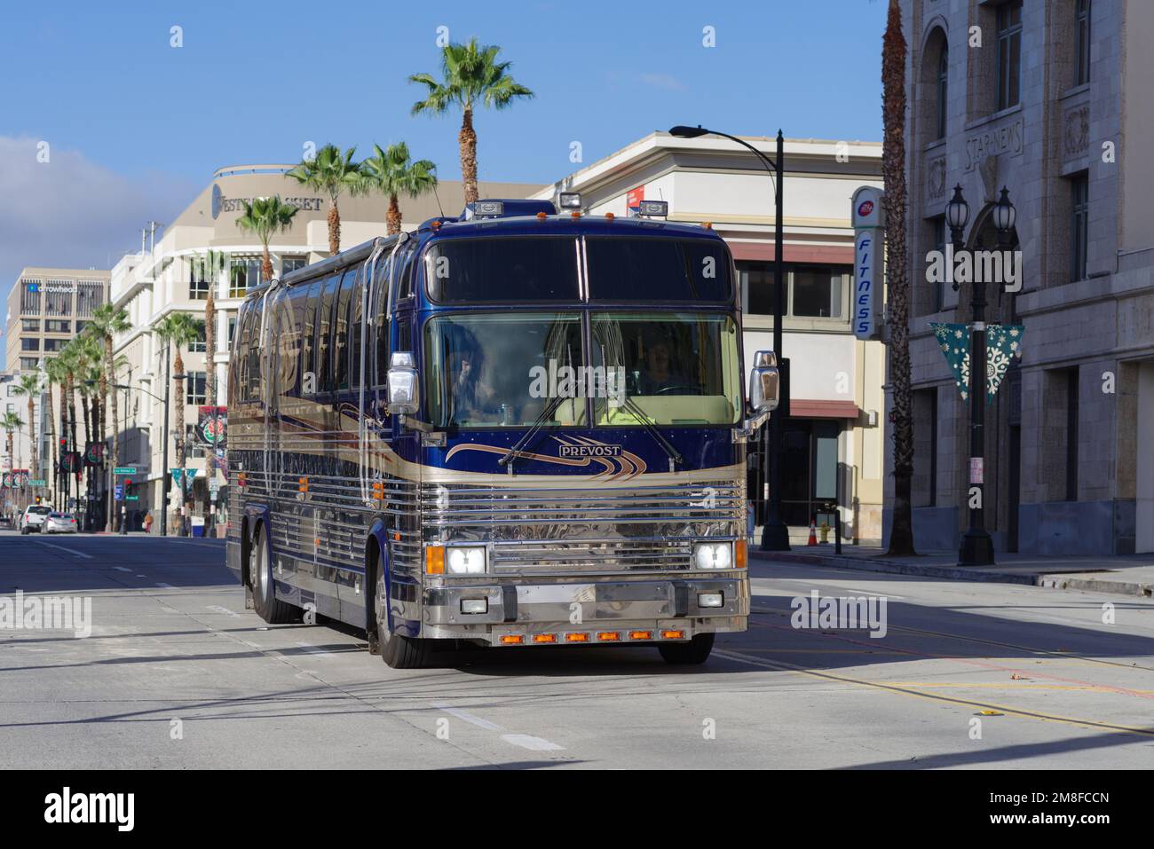 Pasadena, California, United States - January 1, 2023: 1990s Prevost Marathon Motor Couch bus shown driving on Colorado Boulevard in the City of Pasad Stock Photo