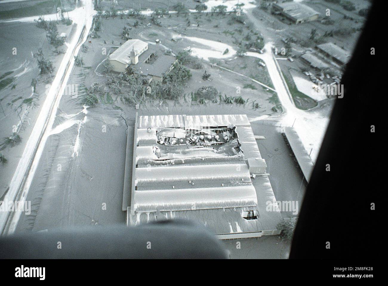 An aerial view of the base's old commissary, showing the damage caused