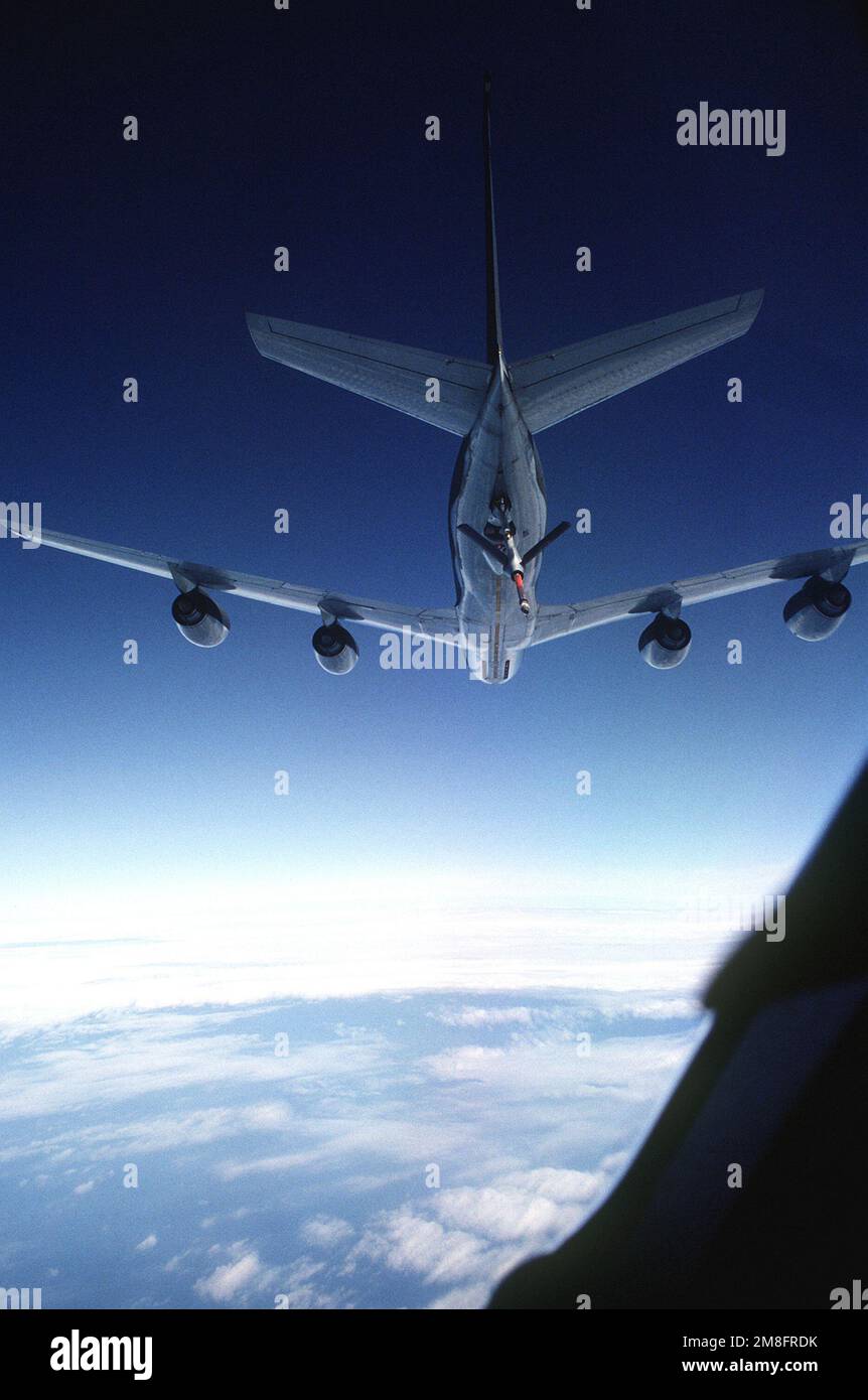 A KC-10A Extender aircraft from the 6th Air Refueling Squadron, 22nd Air Refueling Wing, approaches the refueling boom of the 306th Air Refueling Squadron KC-135R Stratotanker aircraft during a Military Airlift Command channel cargo mission. Country: Unknown Stock Photo