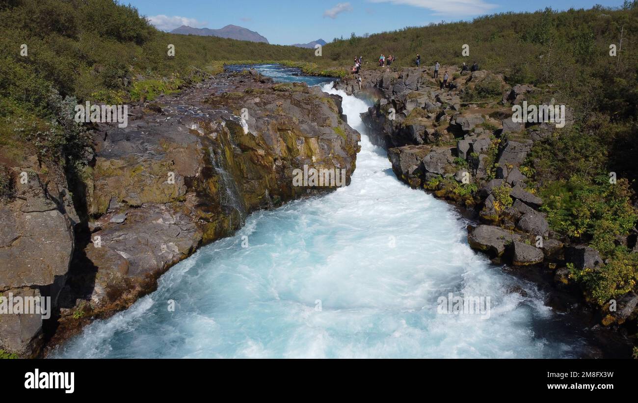 A scenic view of the Hlauptungufoss waterfall on the Bruara River on a sunny day, Iceland Stock Photo
