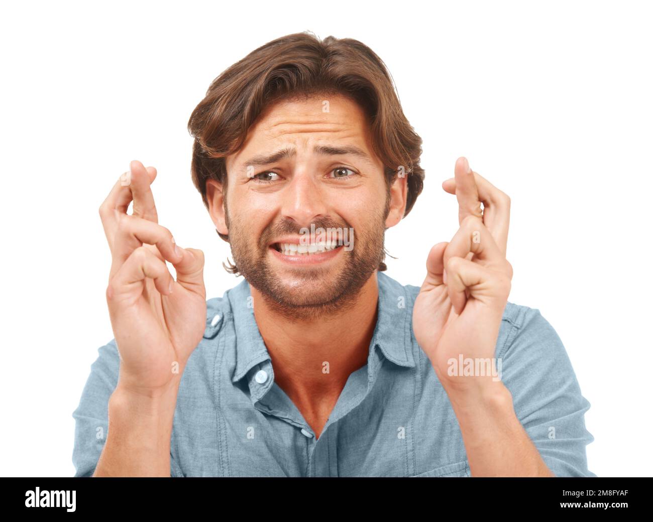 Man hands, face or fingers crossed in anxiety, hope or Canada nervous