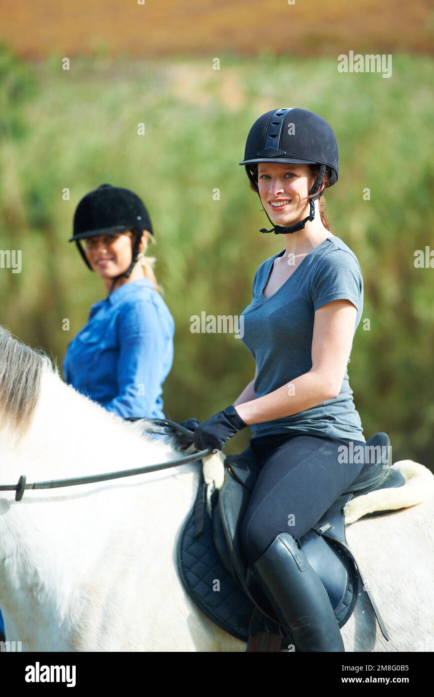Horse riding is safe when you respect the animal. Portrait of two women