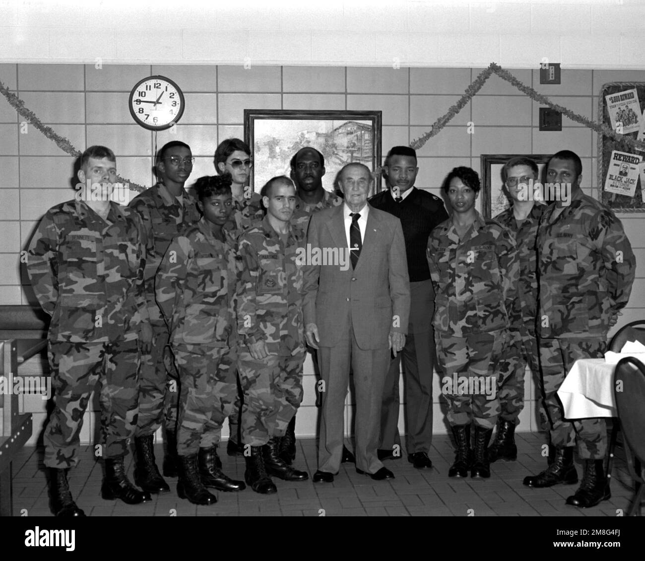 Following a lunchtime reception, U.S. Sen. Strom Thurmond of South Carolina stands with some of his constituents and several soldiers recognized for superior performance during 1990. The personnel are, from left: SPEC. Keith Bennett, PVT. Anthony Sims, PVT. Karen McDaniel, SGT. Joseph Gates, STAFF SGT. Luis Martinez, STAFF SGT. Ivey Jarvis, Sen. Thurmond, STAFF SGT. Maurice Mitchell, SPEC. Winifred Wilson, SGT. Patrick Carr and STAFF SGT. Michael Bosier. Base: Fort Gillem State: Georgia(GA) Country: United States Of America(USA) Stock Photo