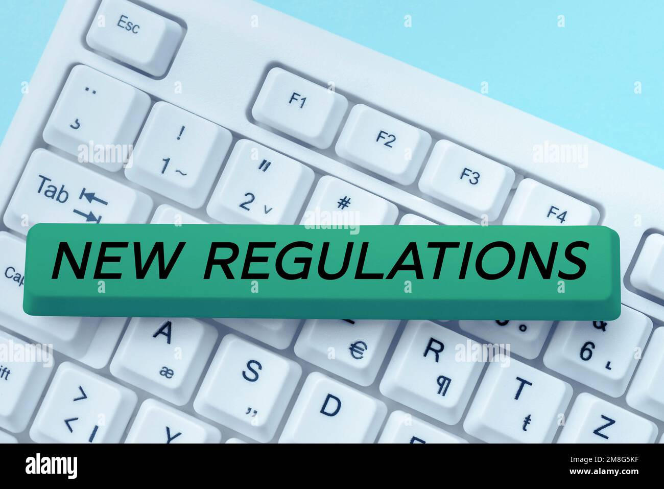 Hand writing sign New Regulations. Word Written on Regulation ...