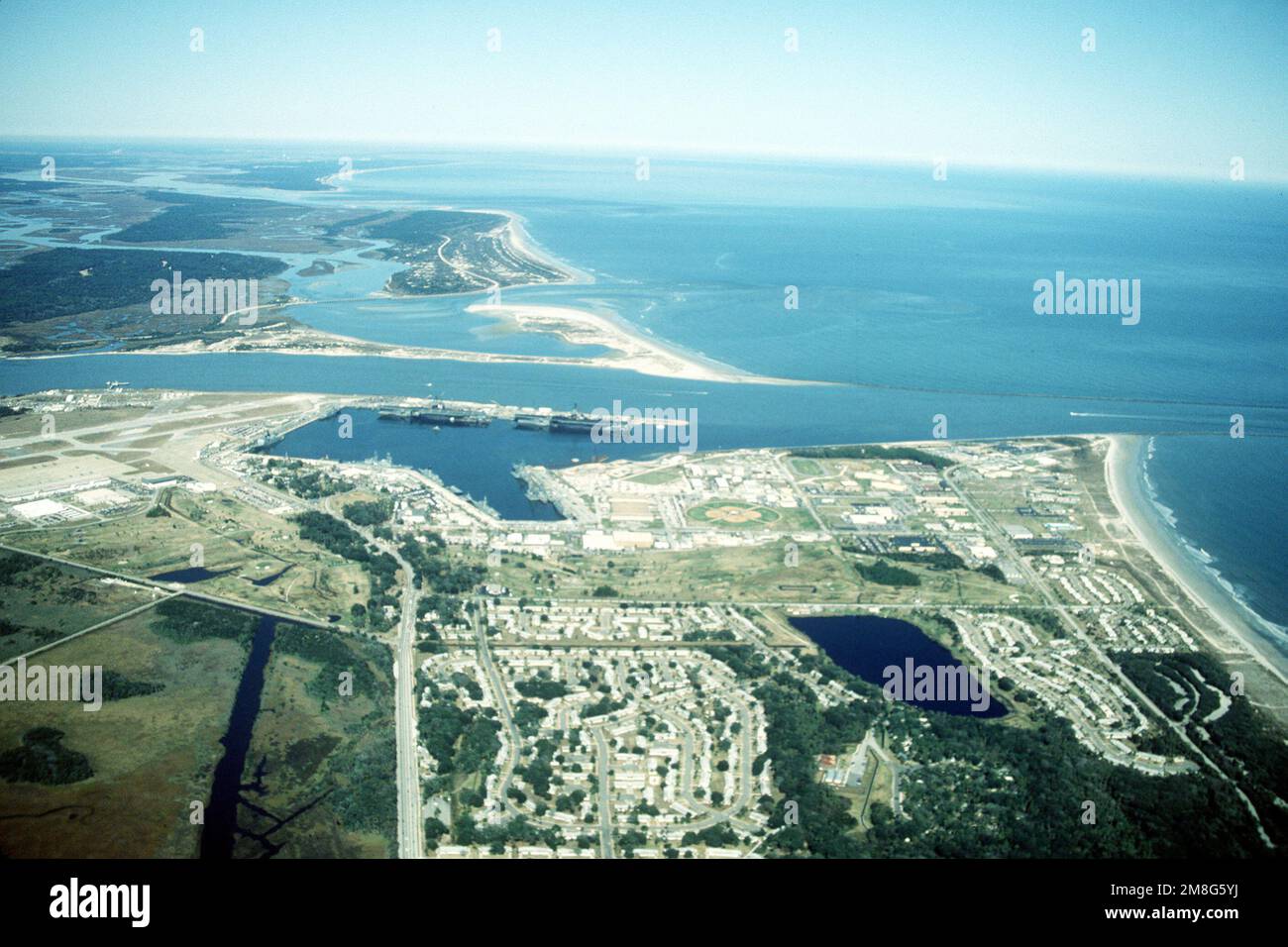 An aerial view of Naval Station Mayport looking north. Two aircraft