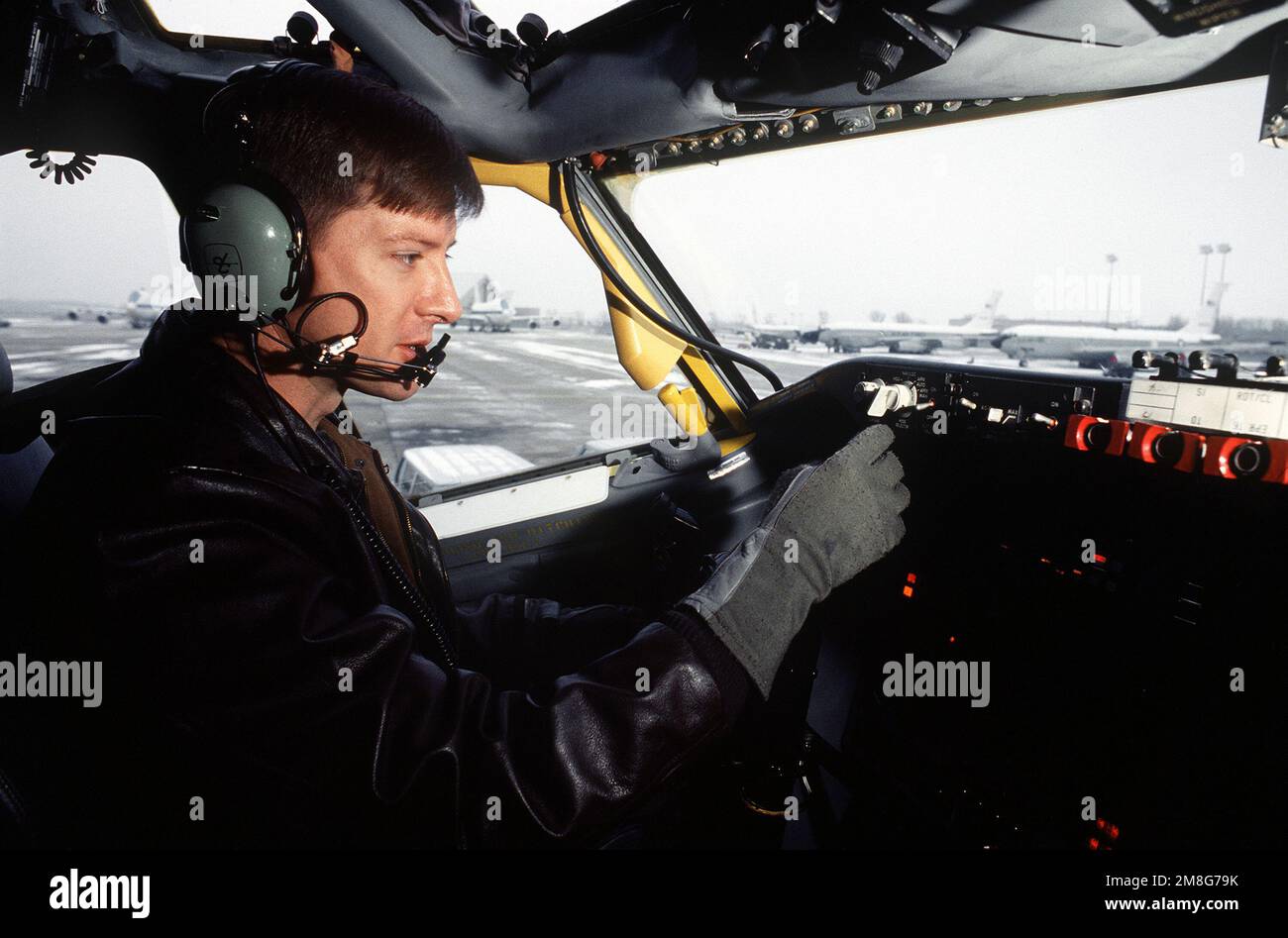 MAJ Mike Swigert, pilot, 38th Strategic Reconnaissance Squadron, 55th Strategic Reconnaissance Wing, Offutt AFB, preflights the cockpit of an RC-135 Stratolifter aircraft. Base: Offutt Air Force Base State: Nebraska (NE) Country: United States Of America (USA) Stock Photo