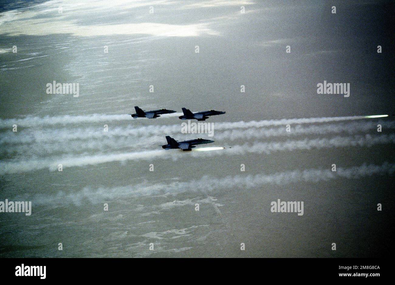 A pair of F/A-18C Hornet aircraft from Strike Fighter Squadron 105 (VFA ...