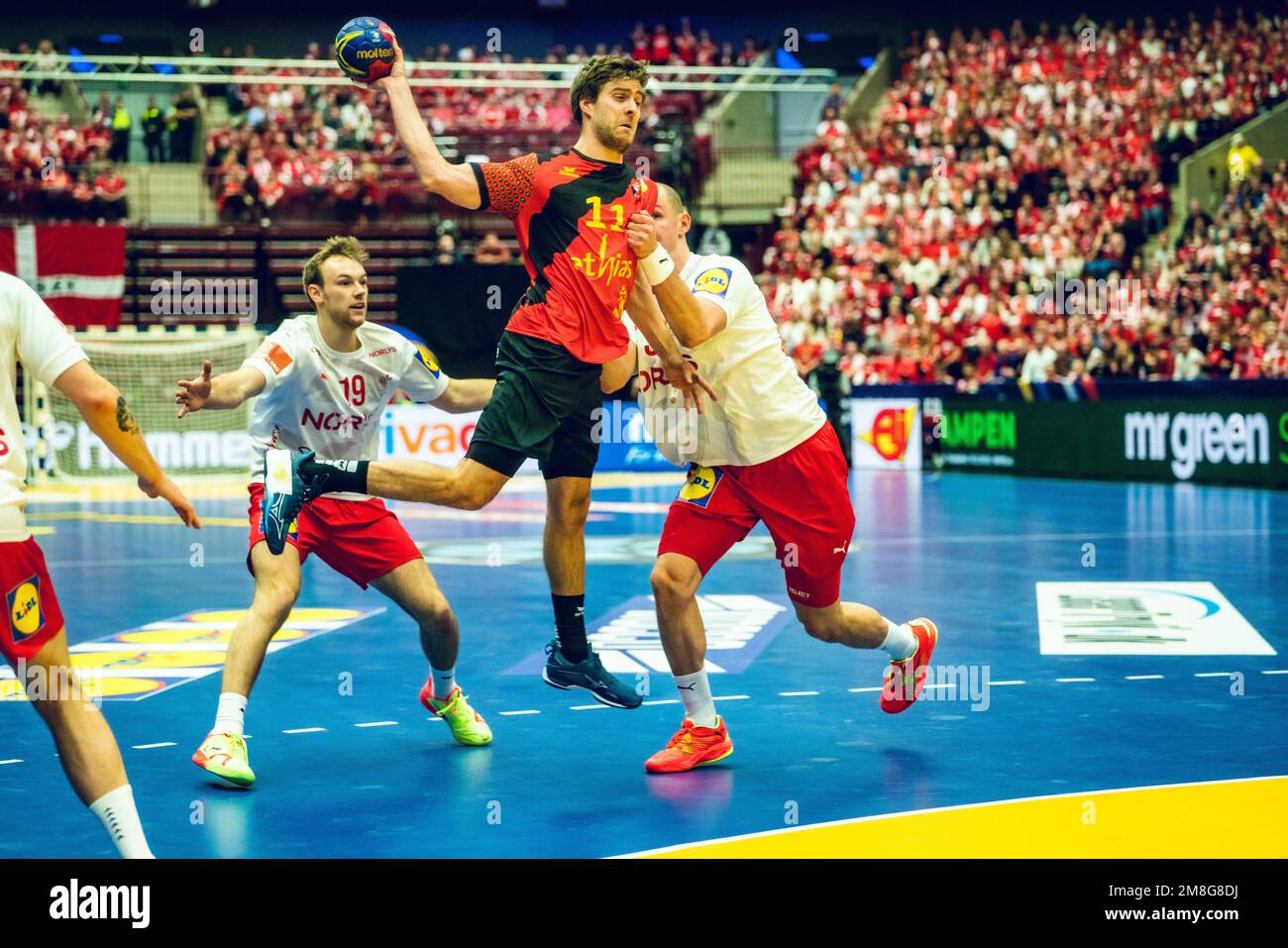 Malmo, Sweden. 13th Jan, 2023. Tom Robyns (11) of Belgium and Simon