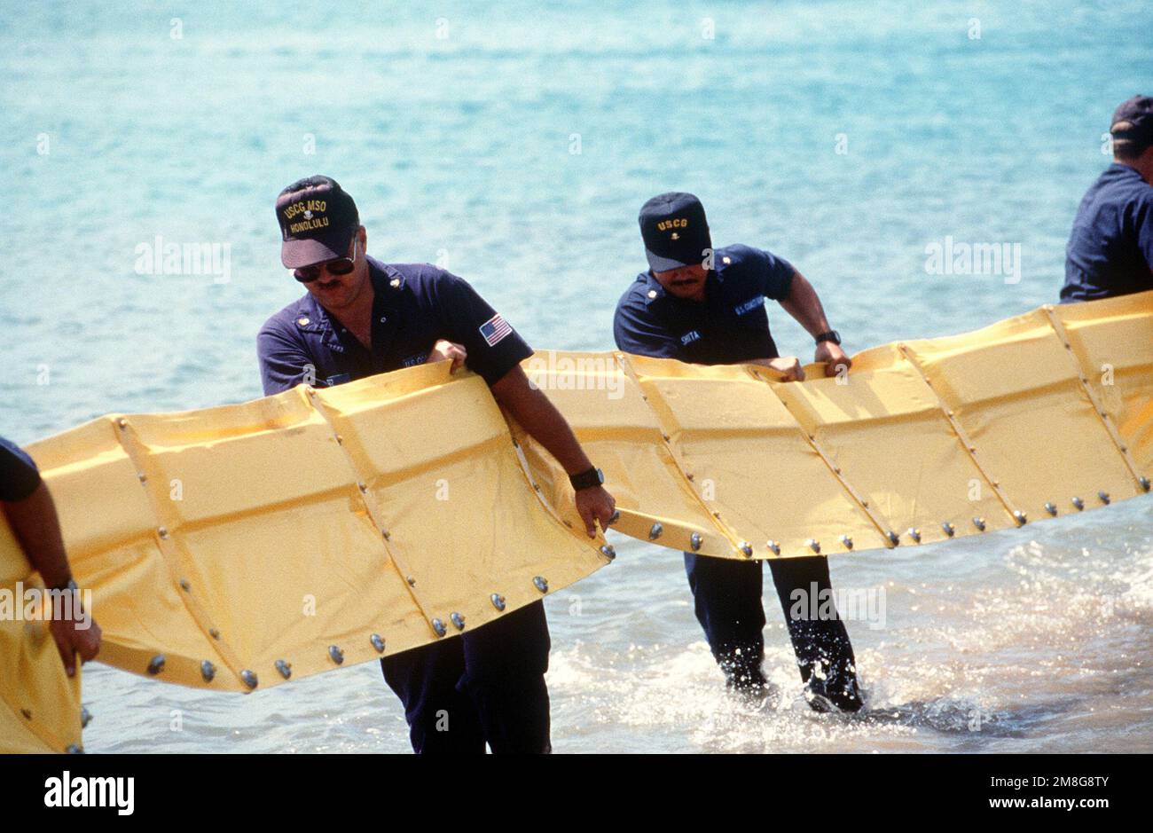 Members of the Coast Guard Marine Safety Office, Honolulu, set up an