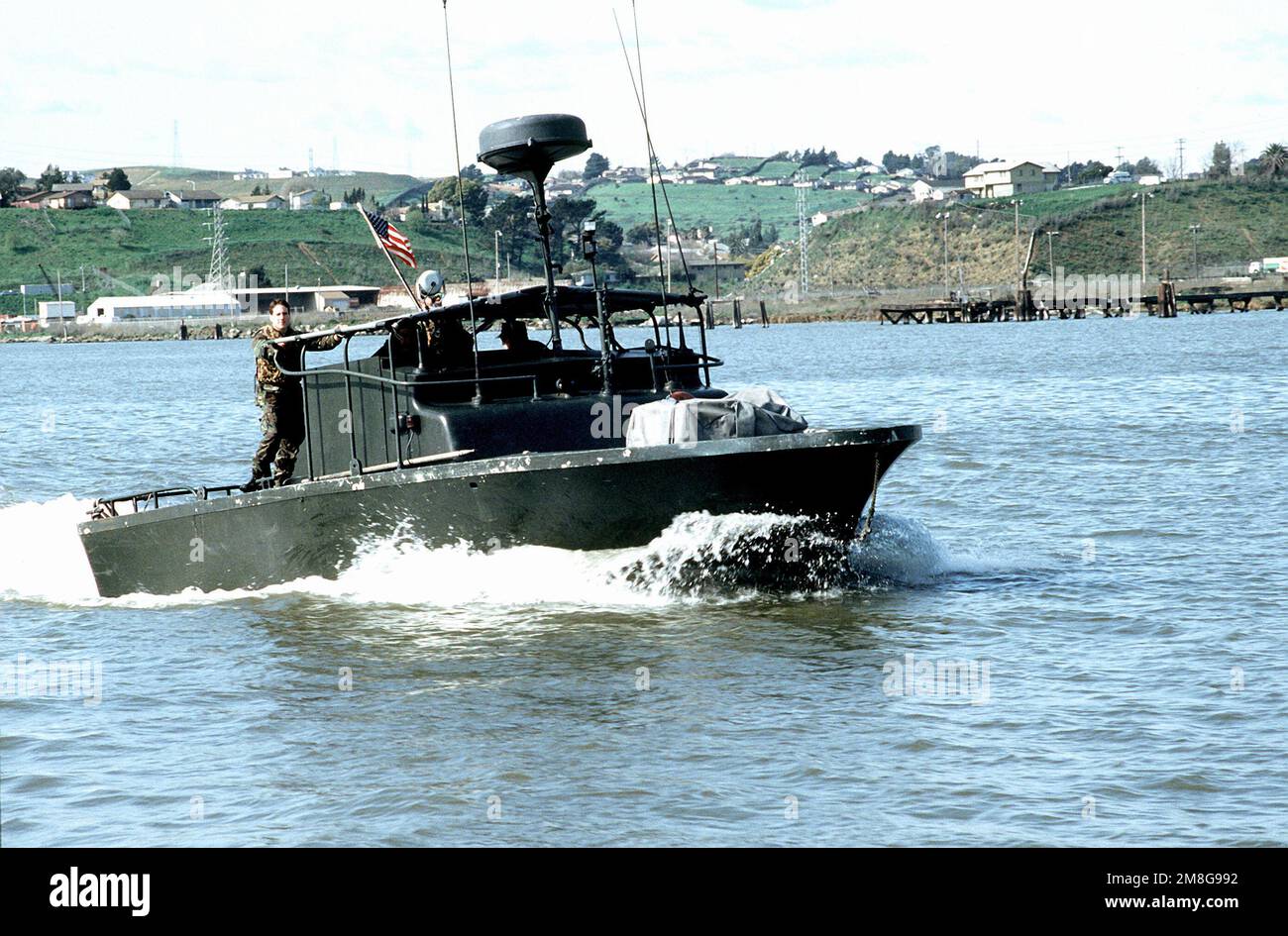 Members of Special Boat Unit 11, Naval Shipyard, Mare Island, train in ...