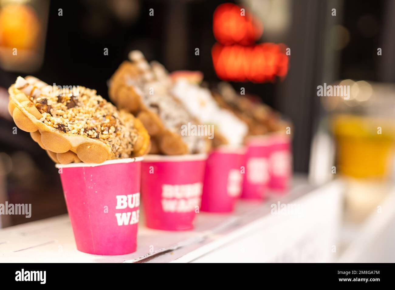 Different types of bubble waffle ice cream to go Stock Photo Alamy