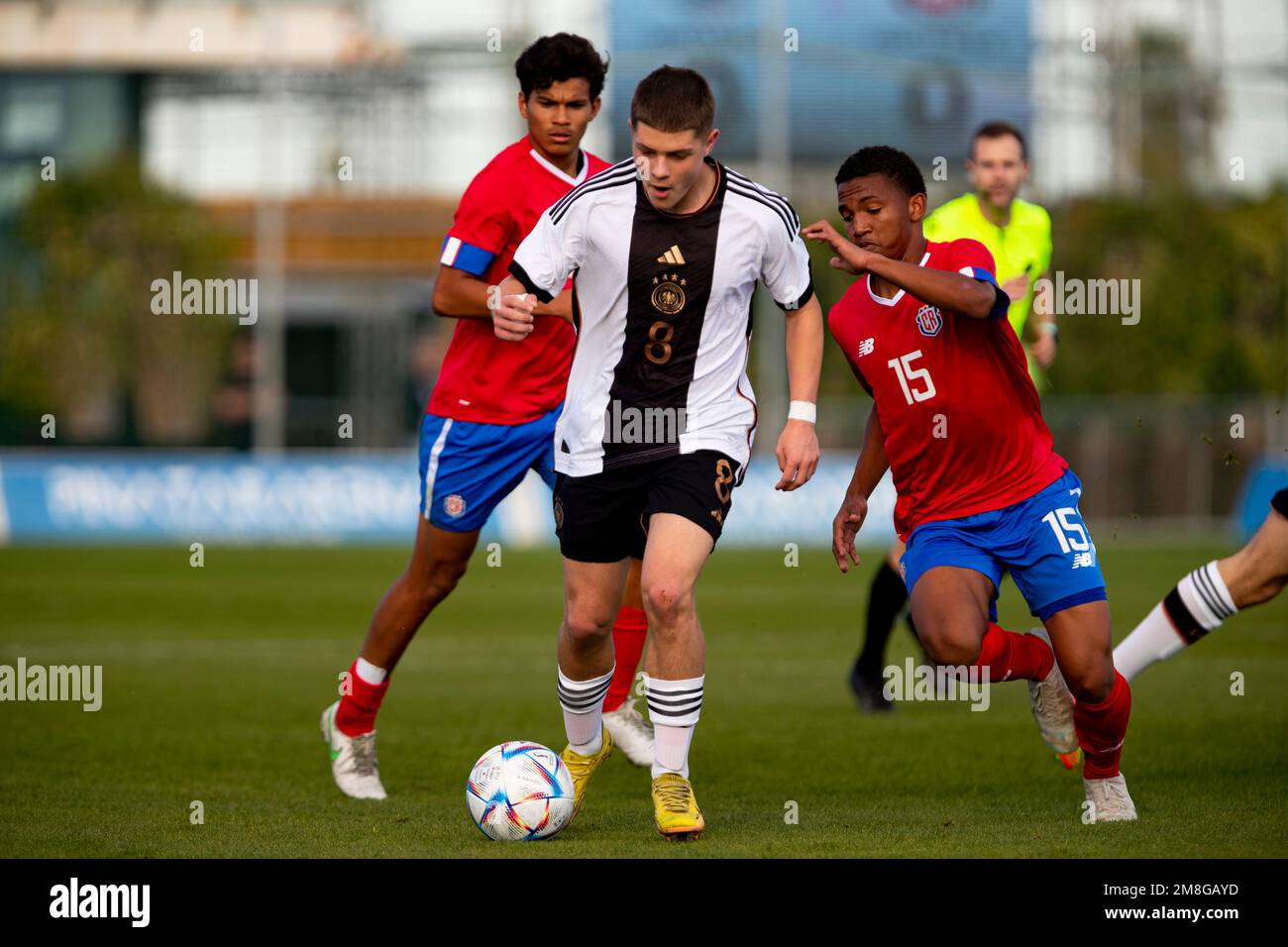 NICK CHERNY of Germany PEÑA RANDY of Costa Rica run with the ball ...