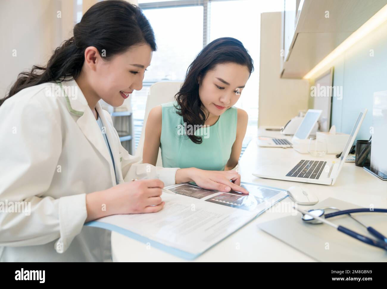 Obstetrics and gynecology doctors received expectant mothers Stock ...