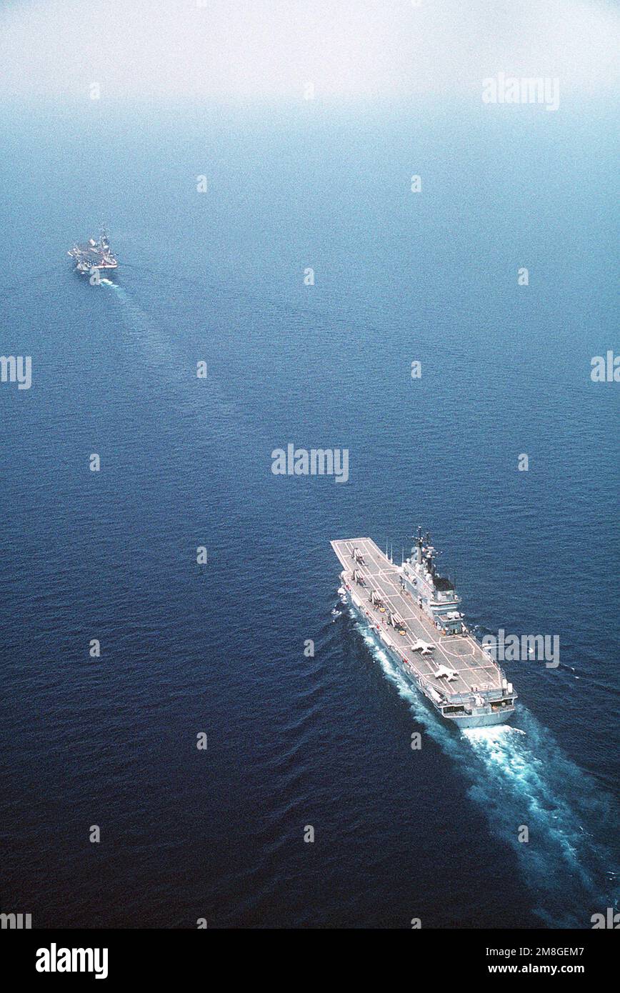 The Italian navy's aircraft carrier GIUSEPPE GARIBALDI (C-551), foreground, follows the French Carrier FOCH (R-99) as the vessels are underway during the joint exercise Dragon Hammer '92. Subject Operation/Series: DRAGON HAMMER '92 Country: Mediterranean Sea(MED) Stock Photo
