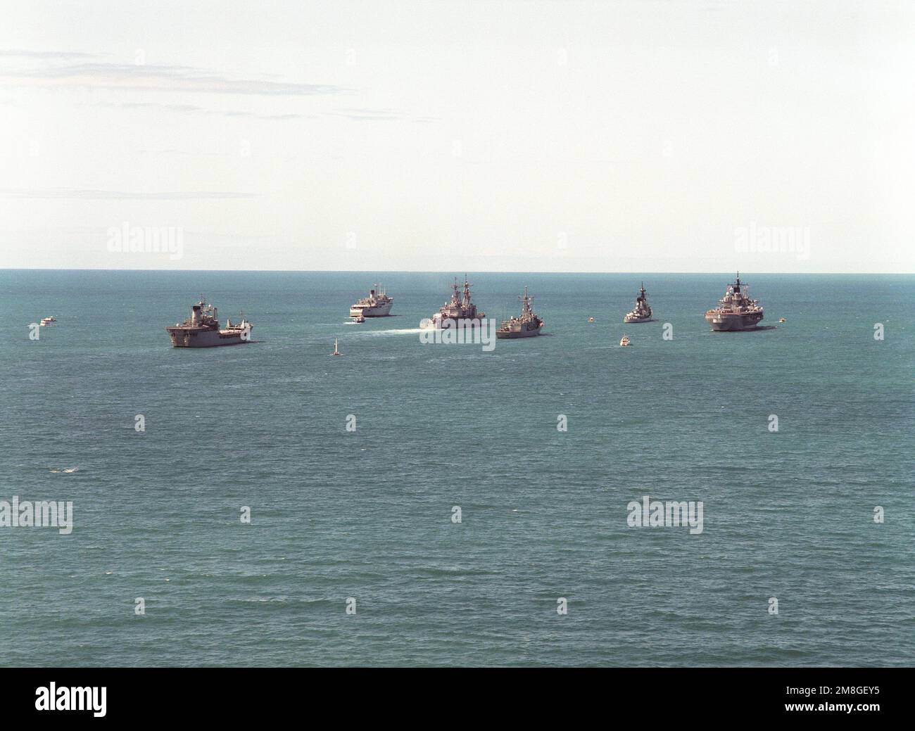 Royal Australian and U.S. Navy warships sail in formation during an ...