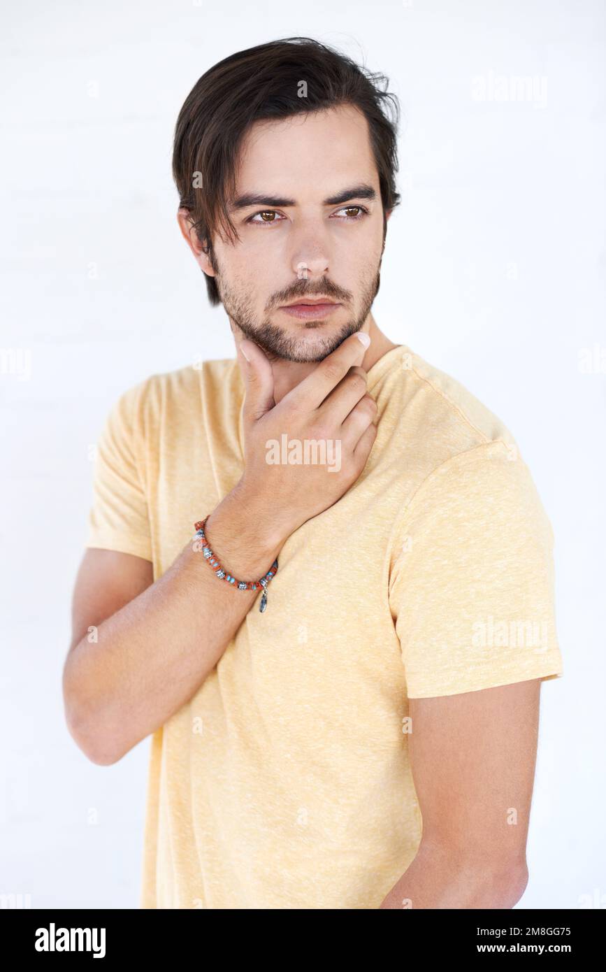 Idea, studio and young man thinking, pensive and focus on contemplating ...