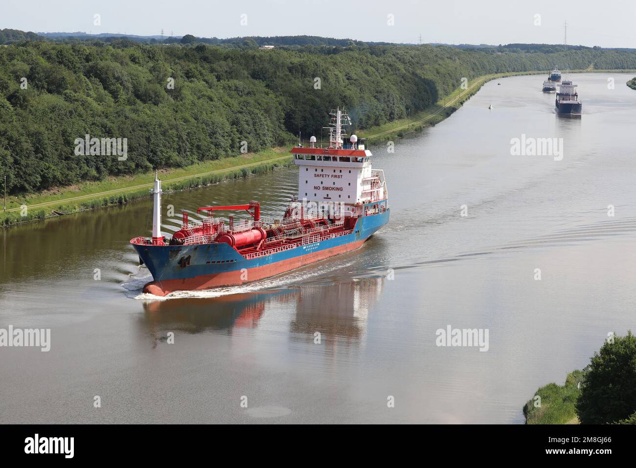 A group of Transport ships sails the North Baltic Canal Stock Photo