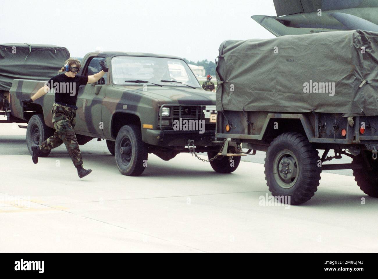 Members of the 438th Airlift Wing's RODEO 92 engine running on/offload ...