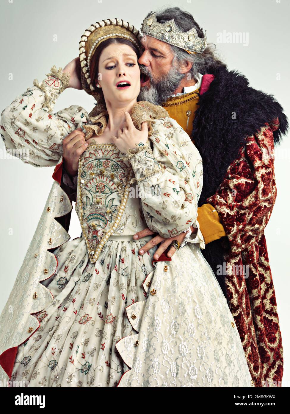 https://c8.alamy.com/comp/2M8GKWX/medieval-king-queen-and-violence-in-studio-for-drama-danger-and-together-with-renaissance-clothes-ancient-royal-couple-surprise-and-shock-with-2M8GKWX.jpg