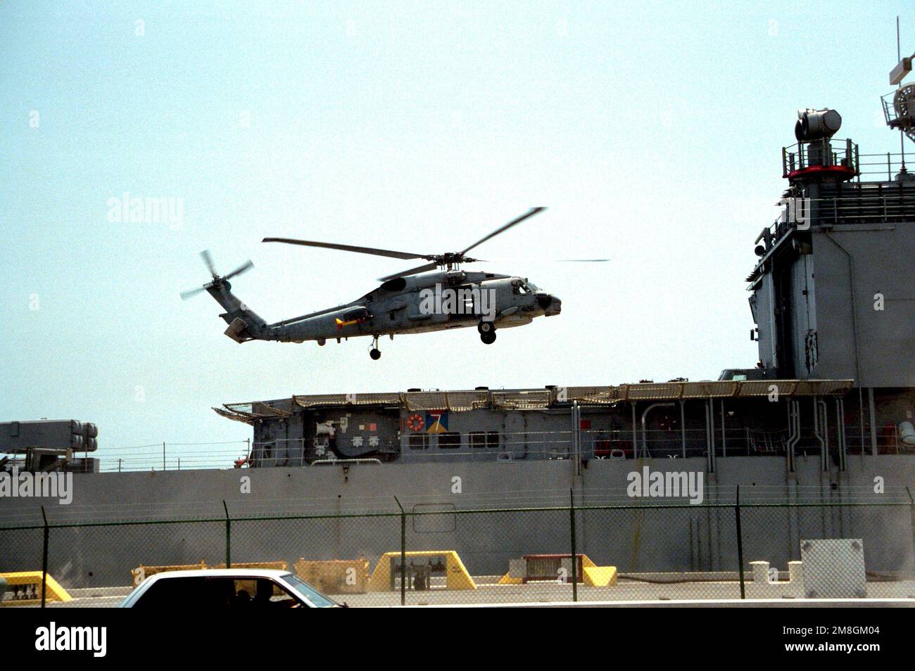 An SH-60B Sea Hawk helicopter takes off from the destroyer USS JOHN HANCOCK (DD-981). Base: Naval Station, Mayport State: Florida(FL) Country: United States Of America (USA) Stock Photo