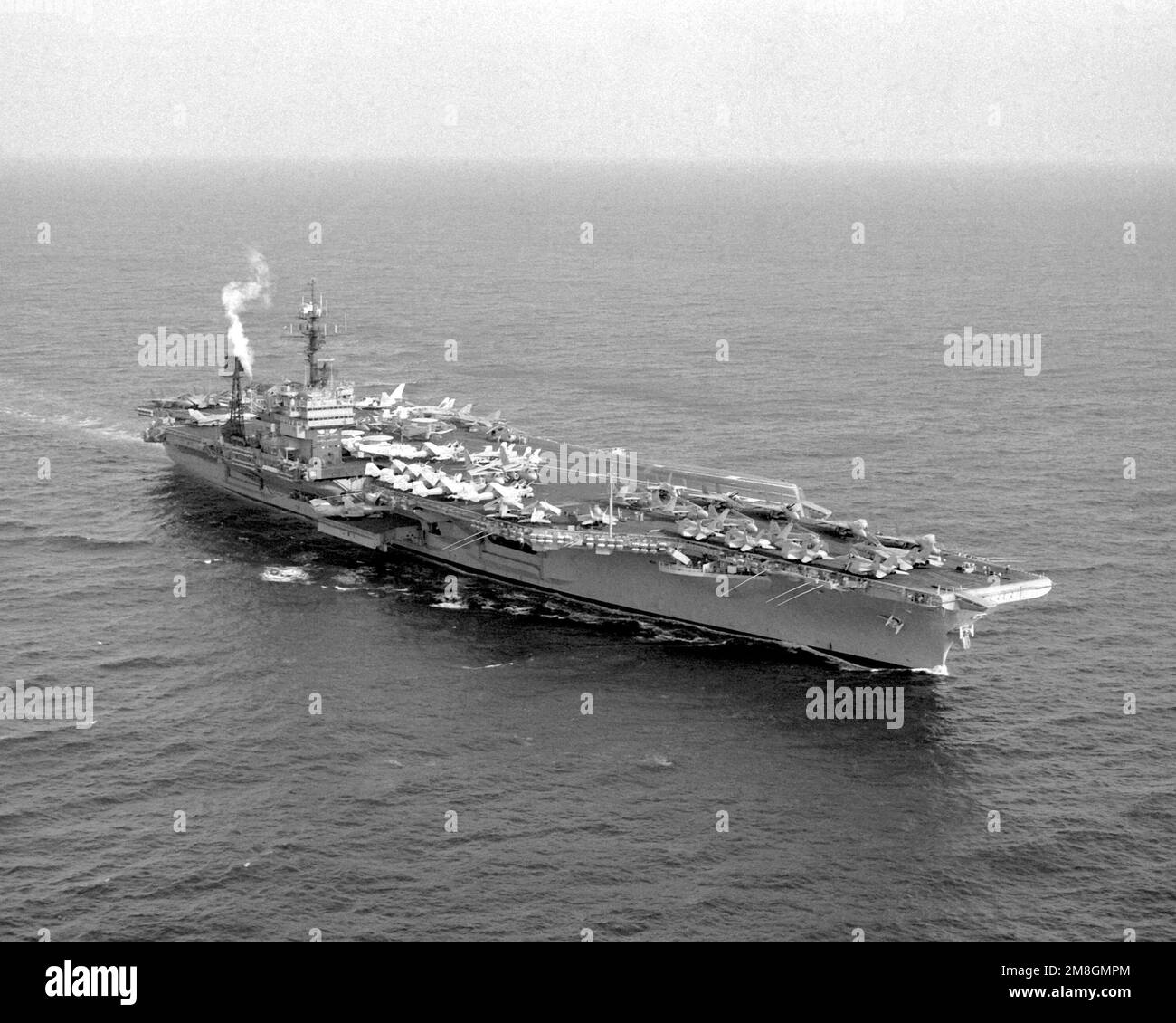 A starboard bow view of the aircraft carrier USS JOHN F. KENNEDY (CV-67 ...