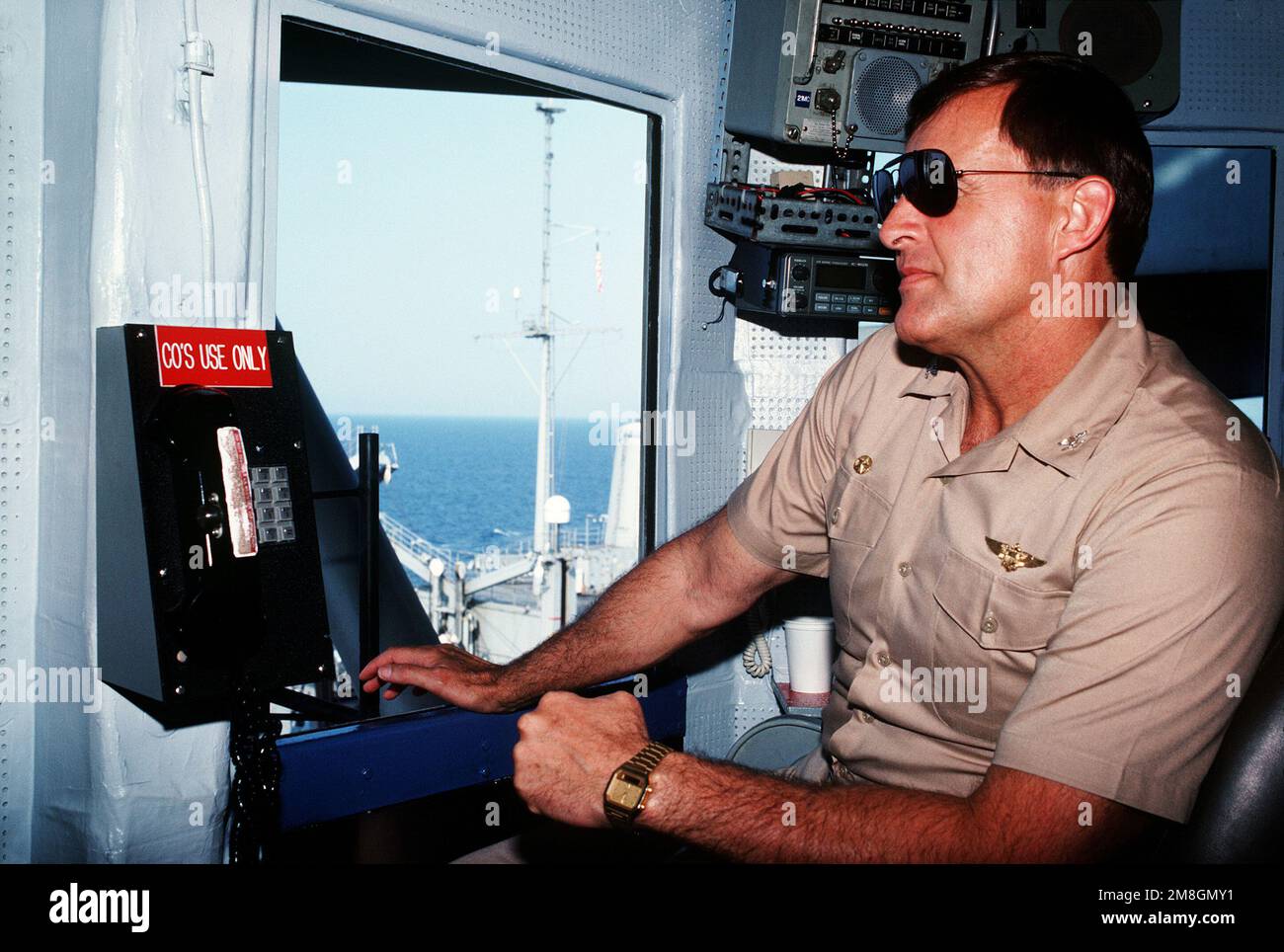 CAPT. J. M. Drager, commanding officer of the aircraft carrier USS ...