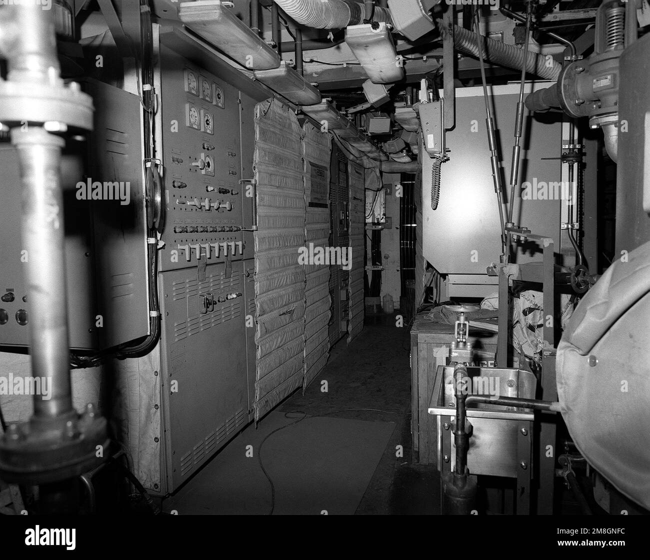 A view of the main engine room No. 2 of the guided missile cruiser LAKE ...