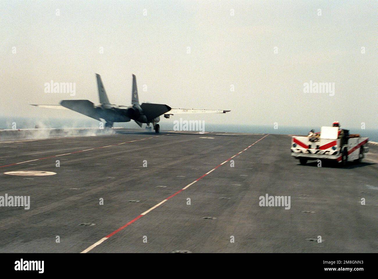 An F14A Tomcat aircraft of Fighter Squadron 14 (VF14) is launched