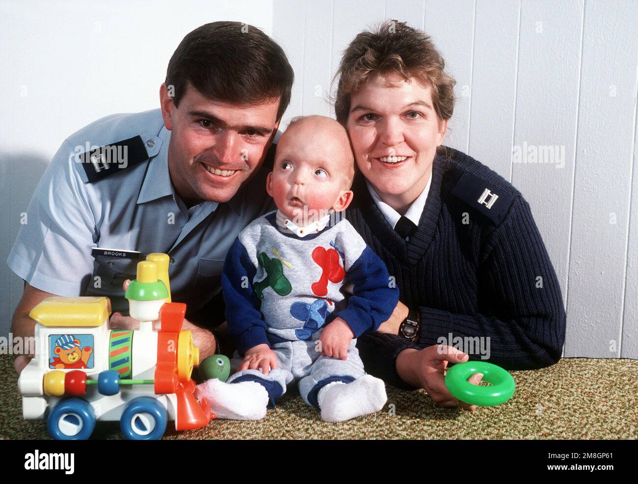 Captains Jerry and Cheryl Brooks pose with their son Joey at the Air