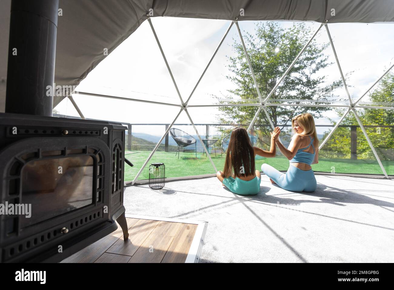 Woman Doing Yoga in Glamping Dome Tent Stock Photo - Image of