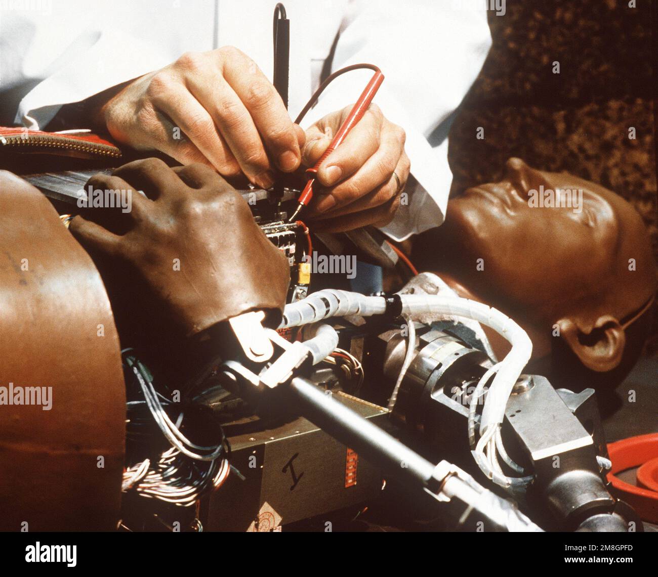 A technician tests circuits on Advanced Dynamic Anthropomorphic Manikin ...