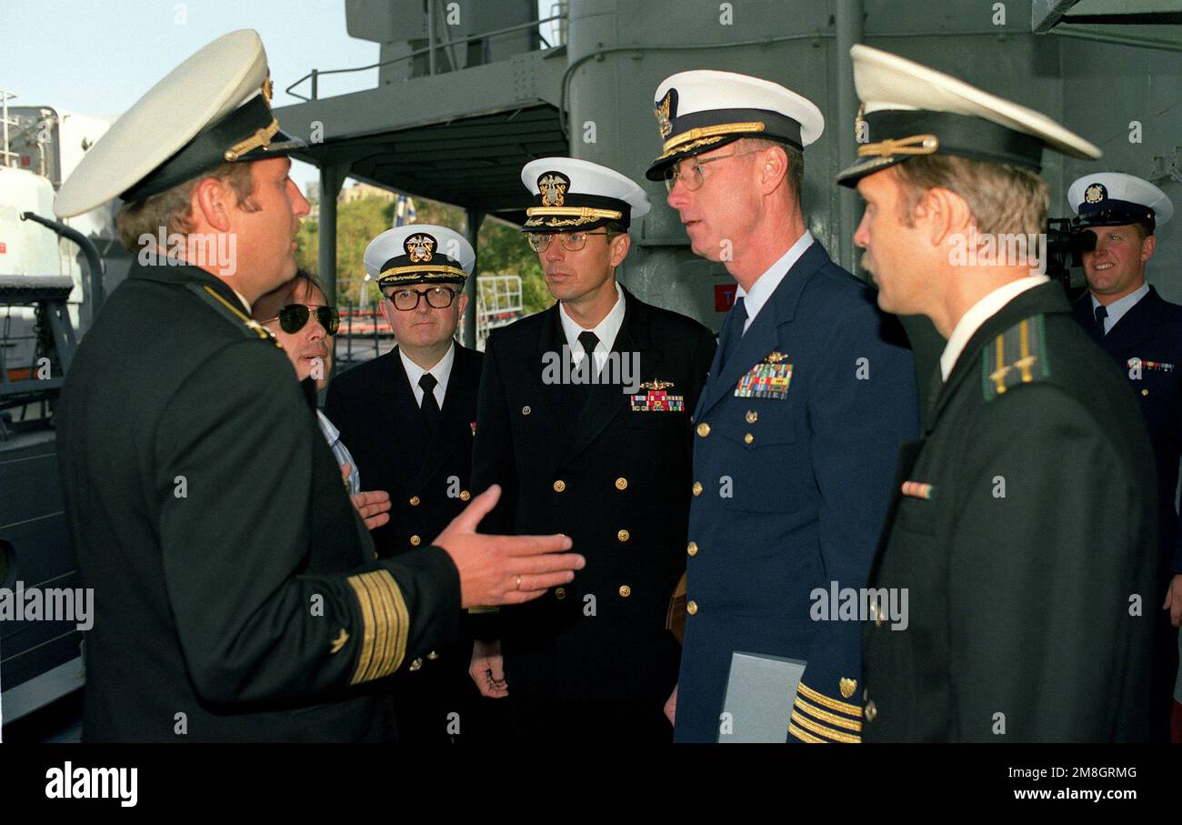 A Russian naval officer speaks to U.S. Navy and Coast Guard officers ...